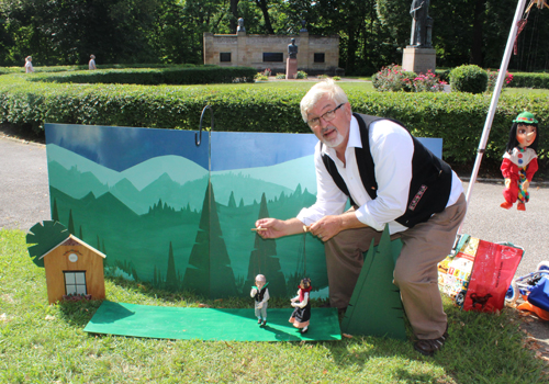 Paul Burik with marionette in Czech Garden on One World Day